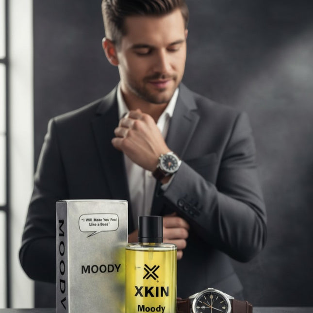 Xkin Moody Eau De Parfum for men, 100ml. Fresh citrus, spicy, and woody notes in a sleek glass bottle with a black cap.